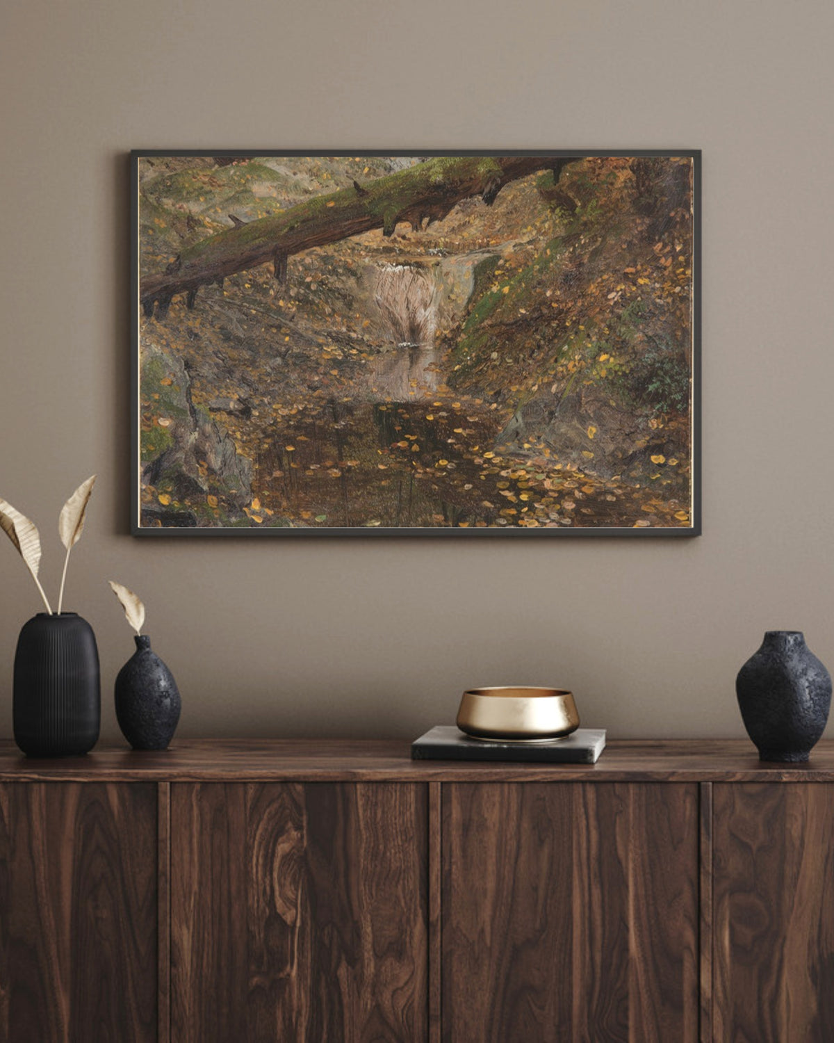 Woodland Stream art print in a black landscape frame above a walnut sideboard