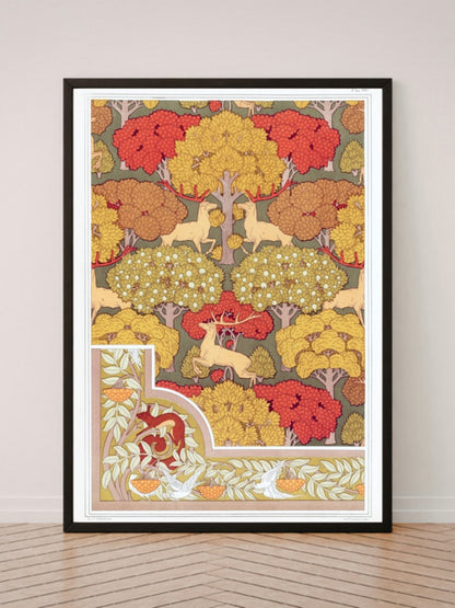 Cerfs et arbres art print in a black frame, leaning against a white wall on a wood floor
